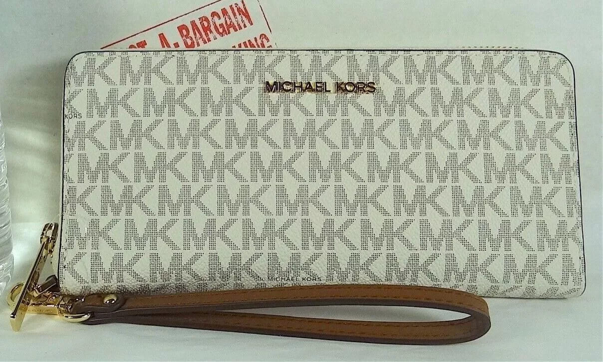 Michael Kors Jet Set Travel ivory Signature PVC Continental Wallet Wristlet
